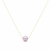 Necklace with a single pink pearl on a white background
