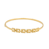 Gold bracelet with geometric design on a white background