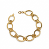 Gold chain bracelet on a white background