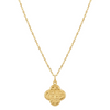 Gold necklace with a clover-shaped pendant on a white background