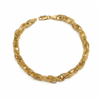 Gold chain bracelet on a white background
