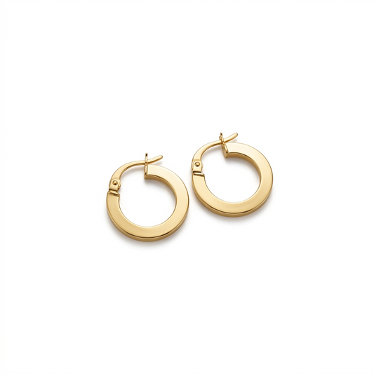 Gold hoop earrings on a white background