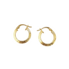 Gold hoop earrings on a white background