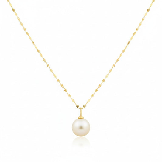 Gold necklace with a single pearl pendant on a white background