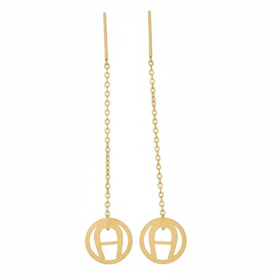 Gold earrings with circular designs on a white background