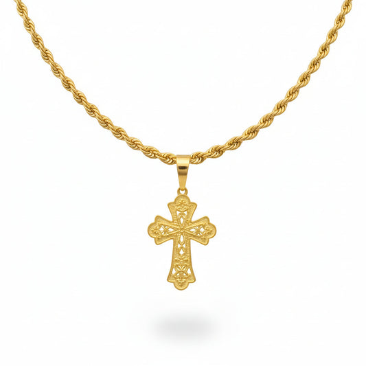 Gold necklace with a cross pendant on a black bust against a beige background