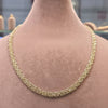 Gold chain necklace on a mannequin with measurements displayed