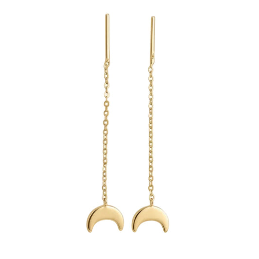 Gold necklace with a crescent moon pendant on a white background