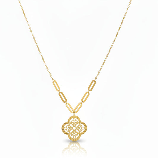 Gold necklace with a pendant on a blue mannequin