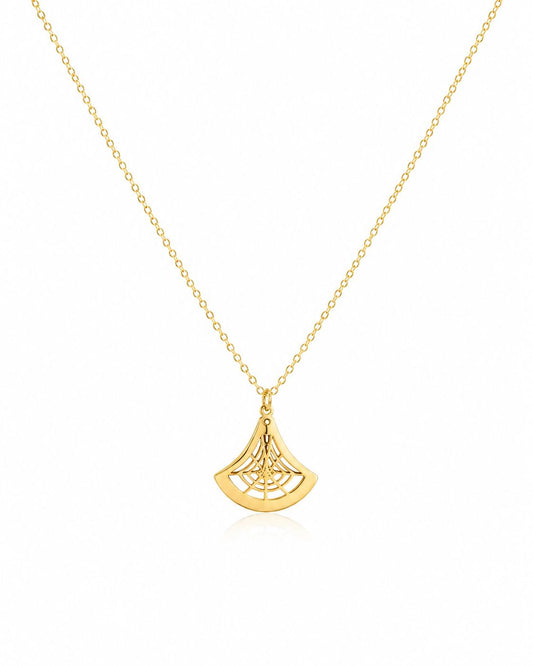 Gold necklace with a fan-shaped pendant on a white background