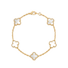 Gold bracelet with white clover-shaped charms on a white background
