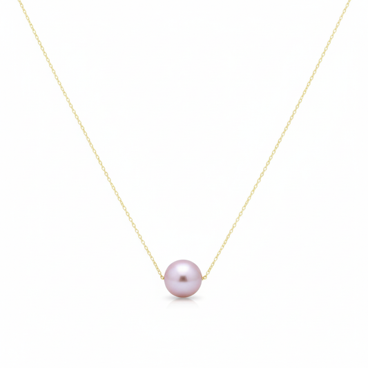 Necklace with a single pink pearl on a white background