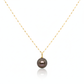 Gold necklace with a dark pearl pendant on a white background