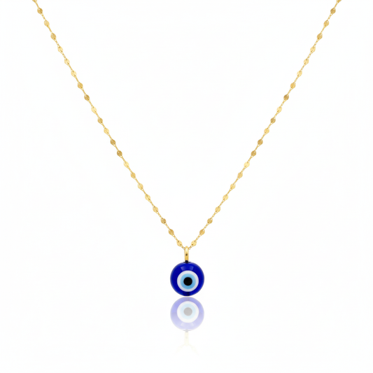 Gold necklace with a blue evil eye pendant on a white background
