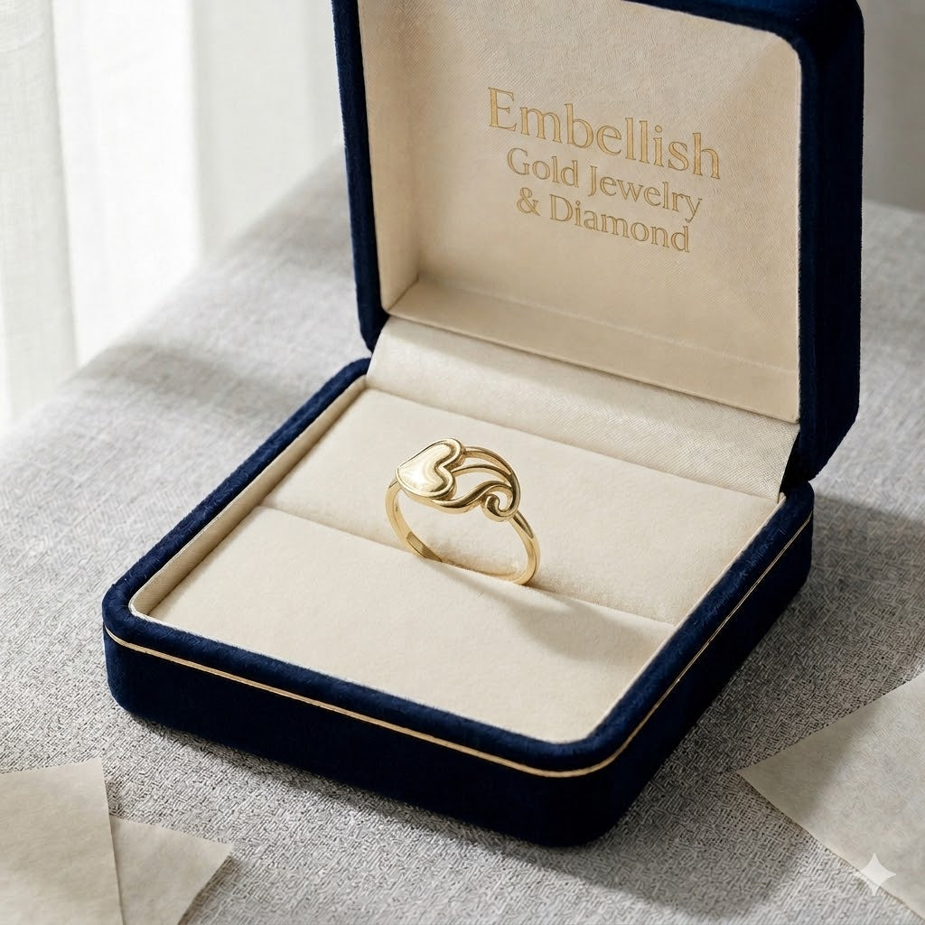 Gold necklace in an open jewelry box with 'Embellish Gold Jewelry & Diamond' branding.