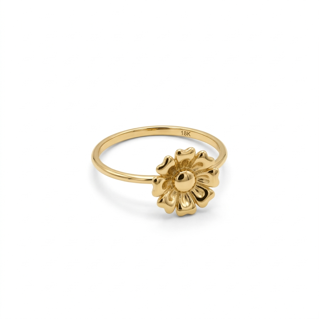 Rose gold ring with emerald-cut diamonds on a white background