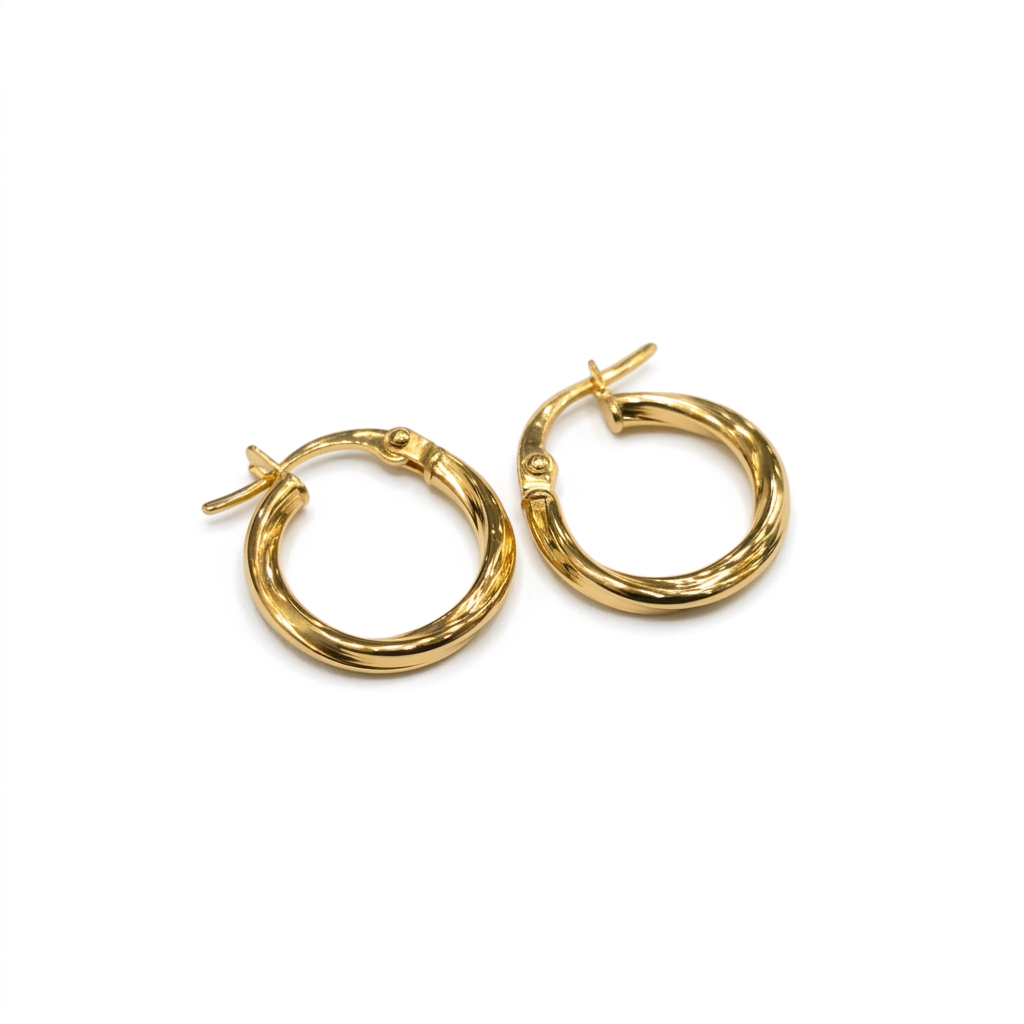 Pair of gold hoop earrings on a white background