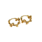Pair of gold hoop earrings on a white background
