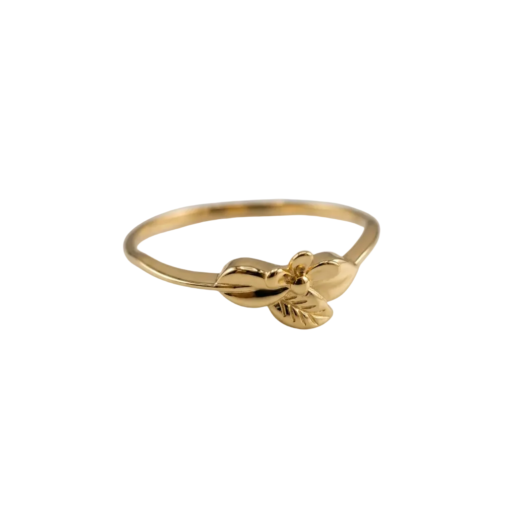 Gold ring with a leaf design on a light gray background