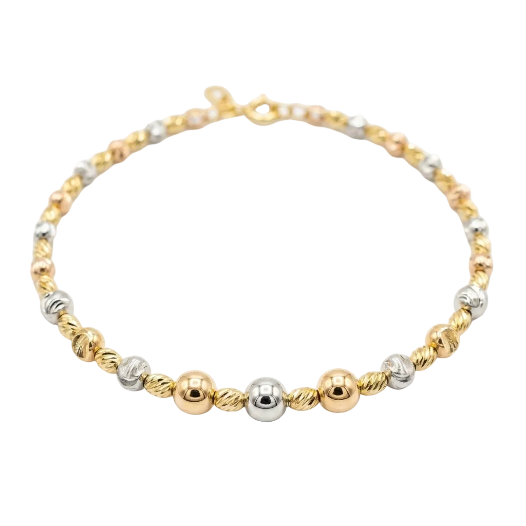 Bracelet with gold and silver beads on a white background