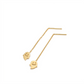 Gold smiley face earrings on a white background