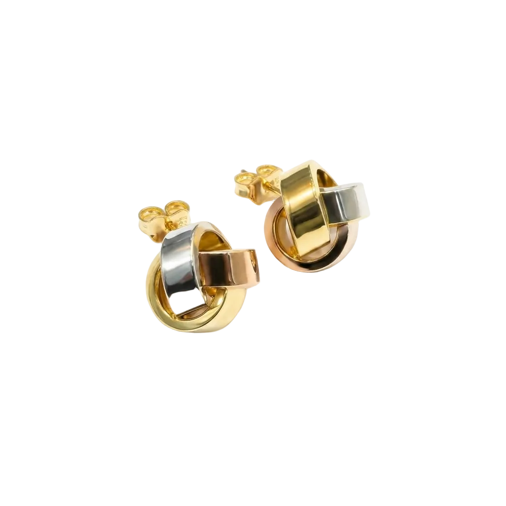Gold and silver knot-style earrings on a white background