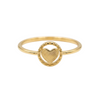 Gold ring with a heart design on a white background