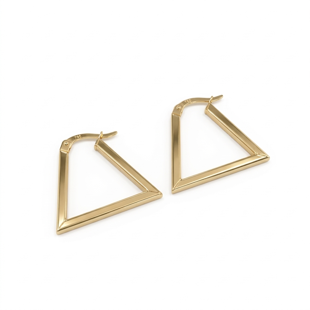 Gold geometric hoop earrings on a white background