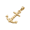 Gold anchor pendant on a light fabric background