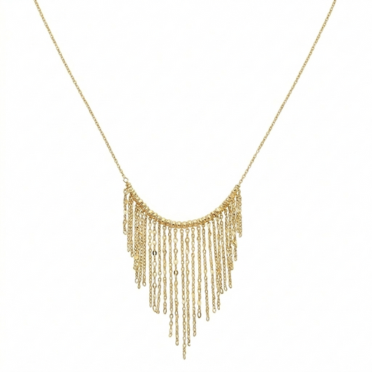 Gold fringe necklace on a white background