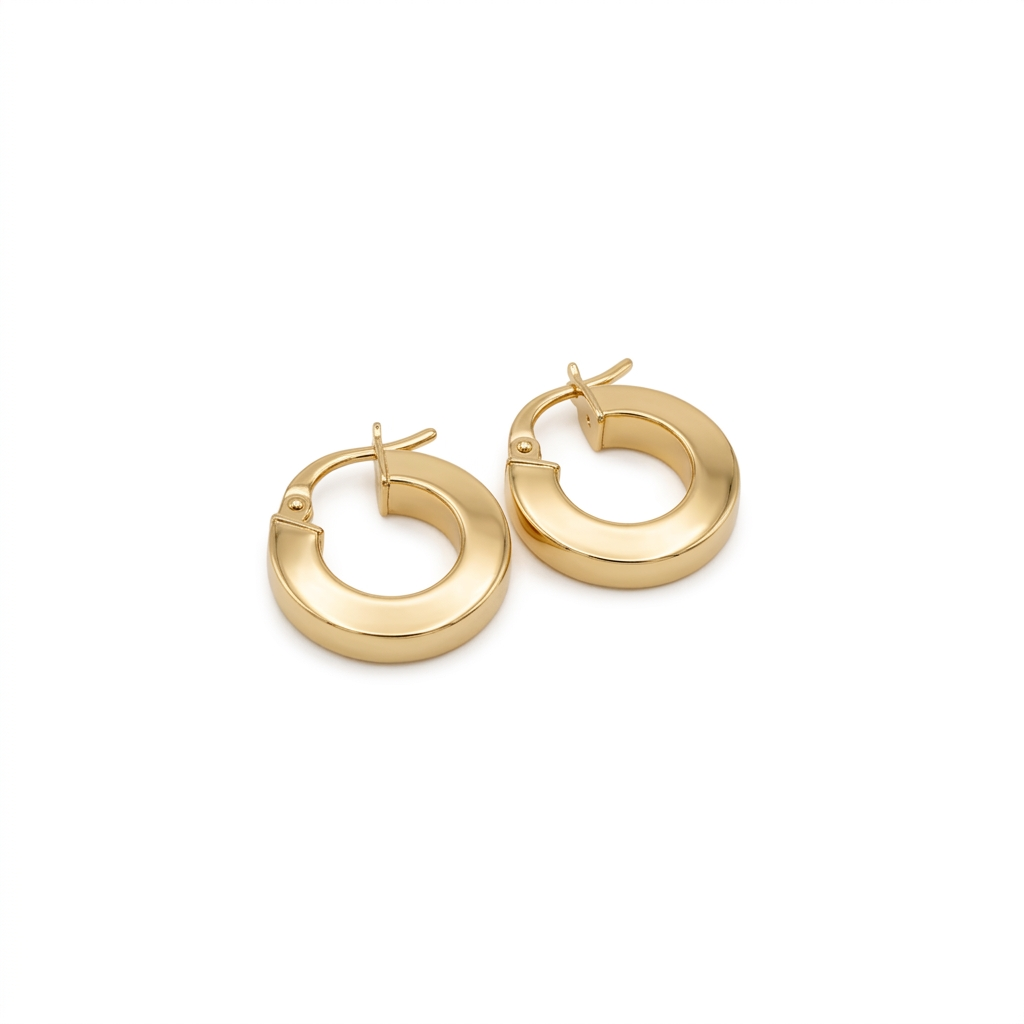 Pair of gold hoop earrings on a white background