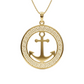 Gold anchor pendant with greek key design on a white background