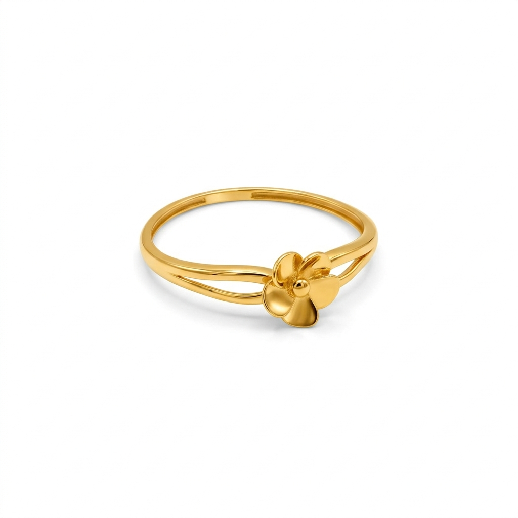 Gold ring with a clover design on a white background