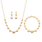 Gold star jewelry set including necklace, bracelet, and earrings on a white background