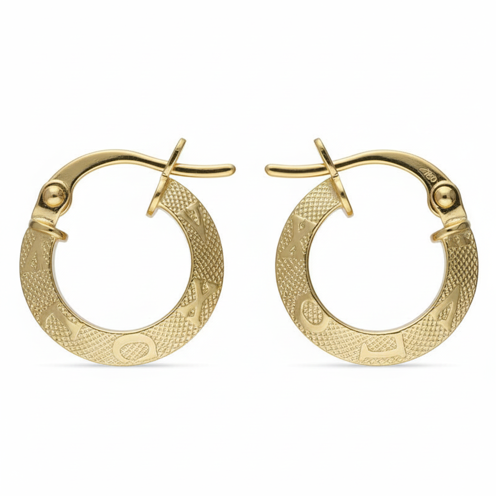 Gold hoop earrings with textured design on a white background