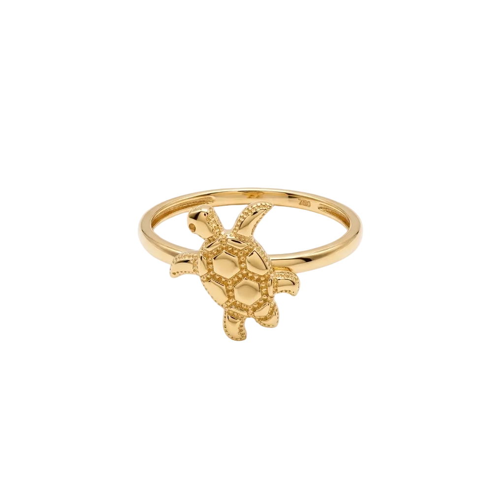 Gold turtle ring on a white background