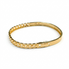Gold bracelet on a white background