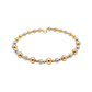 Three-tone gold, silver, and rose gold beaded bracelet on a white background