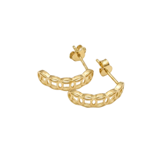 Gold hoop earrings on a white background
