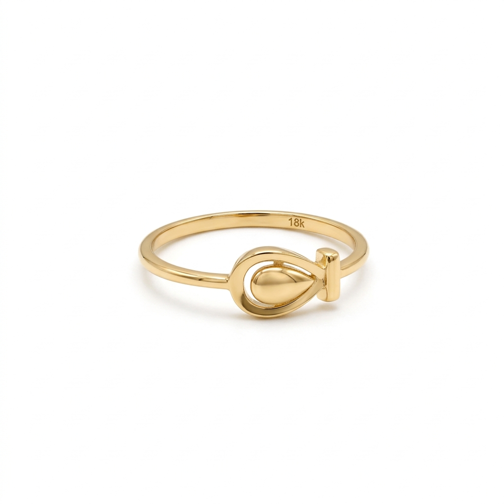 Gold ring with a unique design on a white background