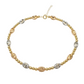 Gold and silver beaded necklace on a white background