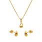 Gold necklace and earrings set on a white background