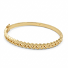 Gold bracelet on a white background
