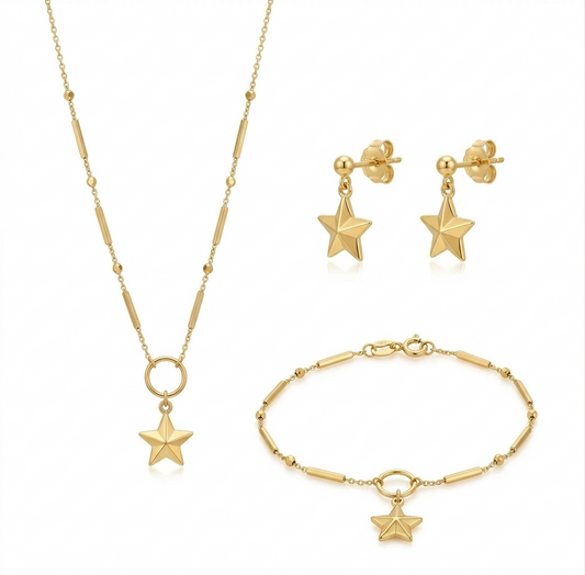 Gold jewelry set with star-shaped pendants including necklace, bracelet, and earrings on a white background.