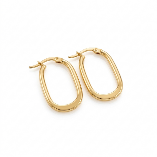Gold hoop earrings on a white background