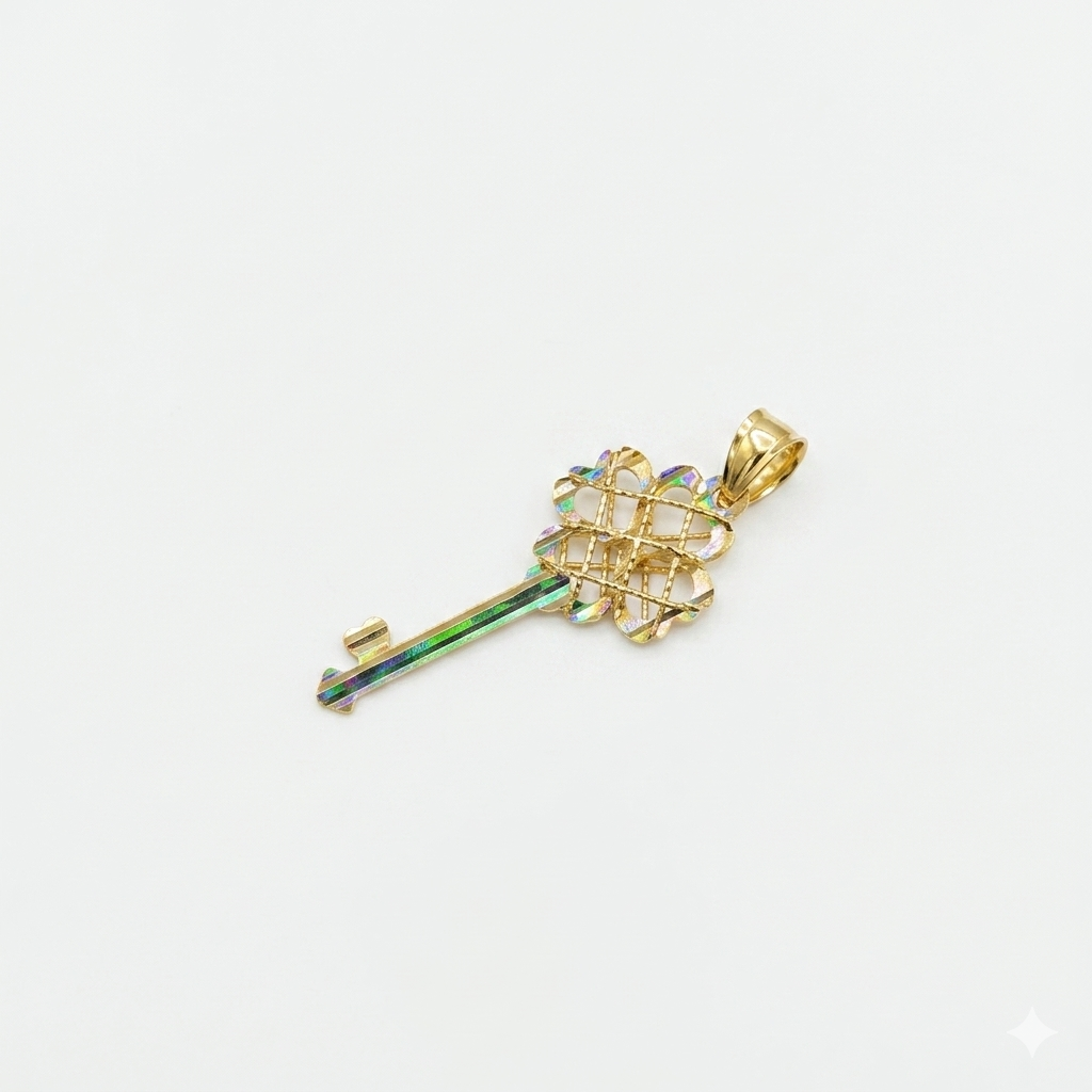 Gold key-shaped pendant with a textured design on a light gray background