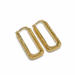 Gold hoop earrings with textured design on a white background