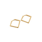Gold hoop earrings on a white background