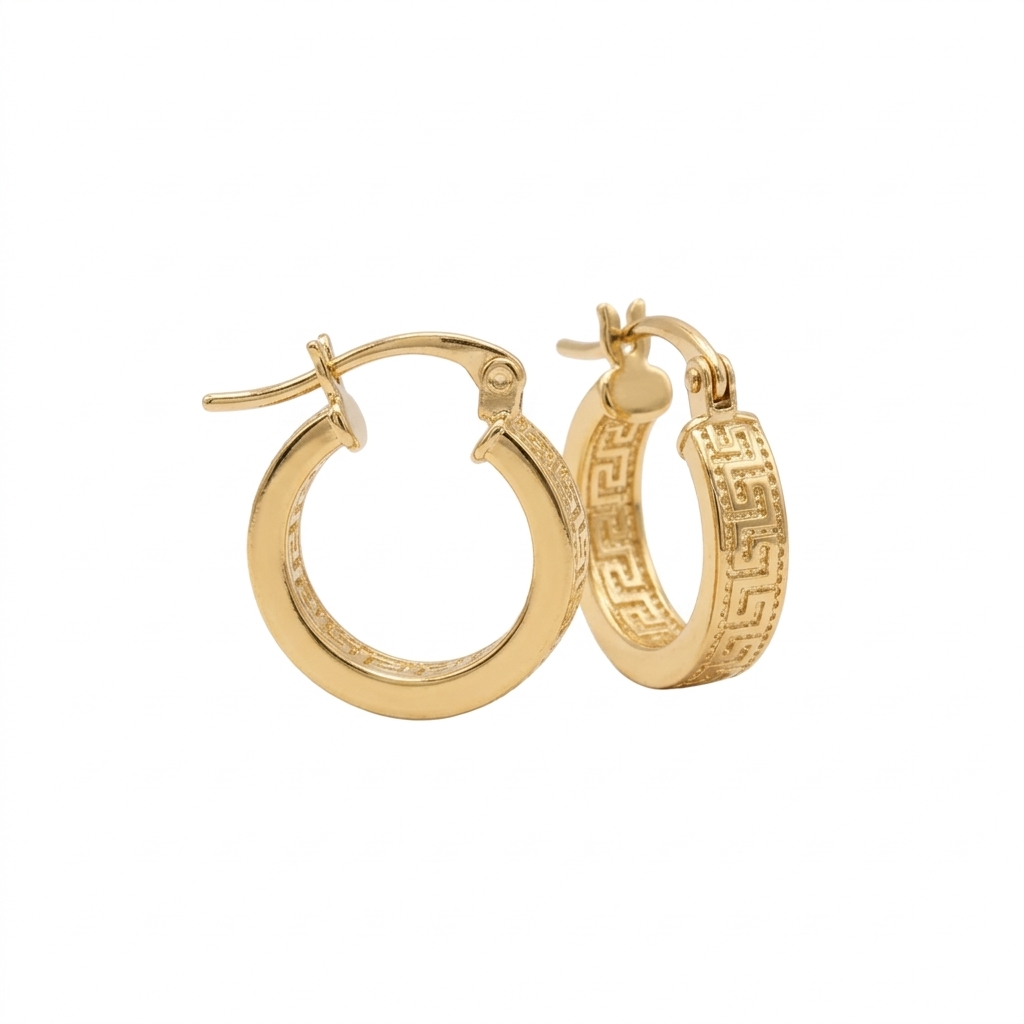Gold hoop earrings with intricate designs on a white background