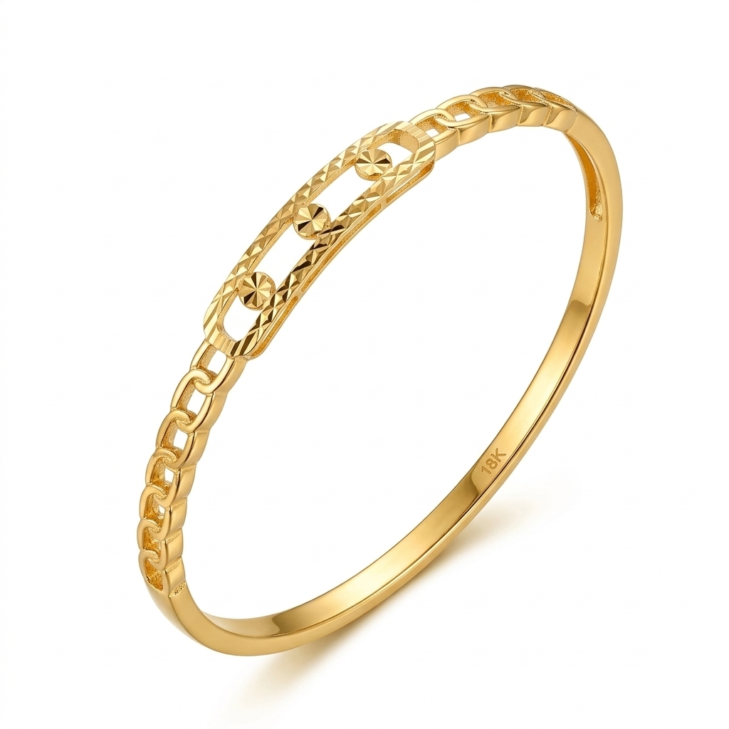 Gold bracelet with intricate design on a white background